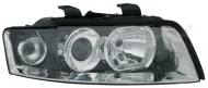 20-11214-05-2 TYC - REFLEKTOR LE. D1S/H7 AUDI A4 